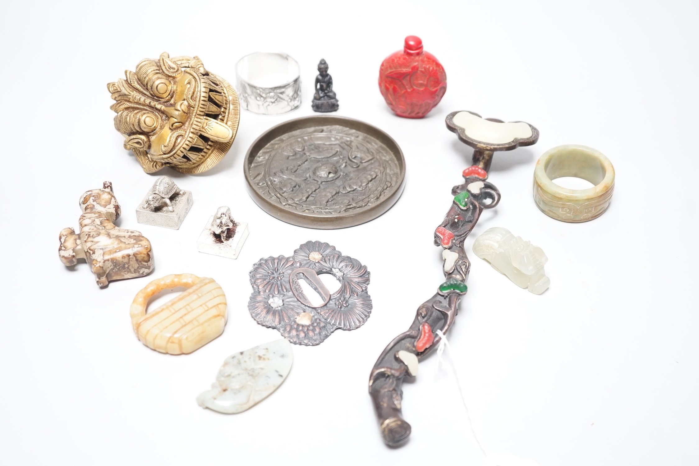 A selection of various Oriental items, including Chinese hardstone carvings, Japanese cast bronze mirror, snuff bottle, Japanese napkin ring etc.